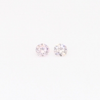 0.08 Total carat pair of round cut Argyle pink diamonds