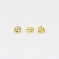 0.09 Total carat trio of round cut yellow diamonds