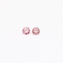 0.06 Total carat pair of round cut 2P Argyle pink diamonds