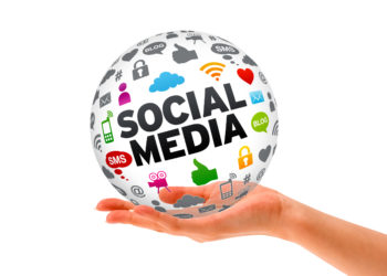 Hand holding a Social Media 3d Sphere sign on white background.